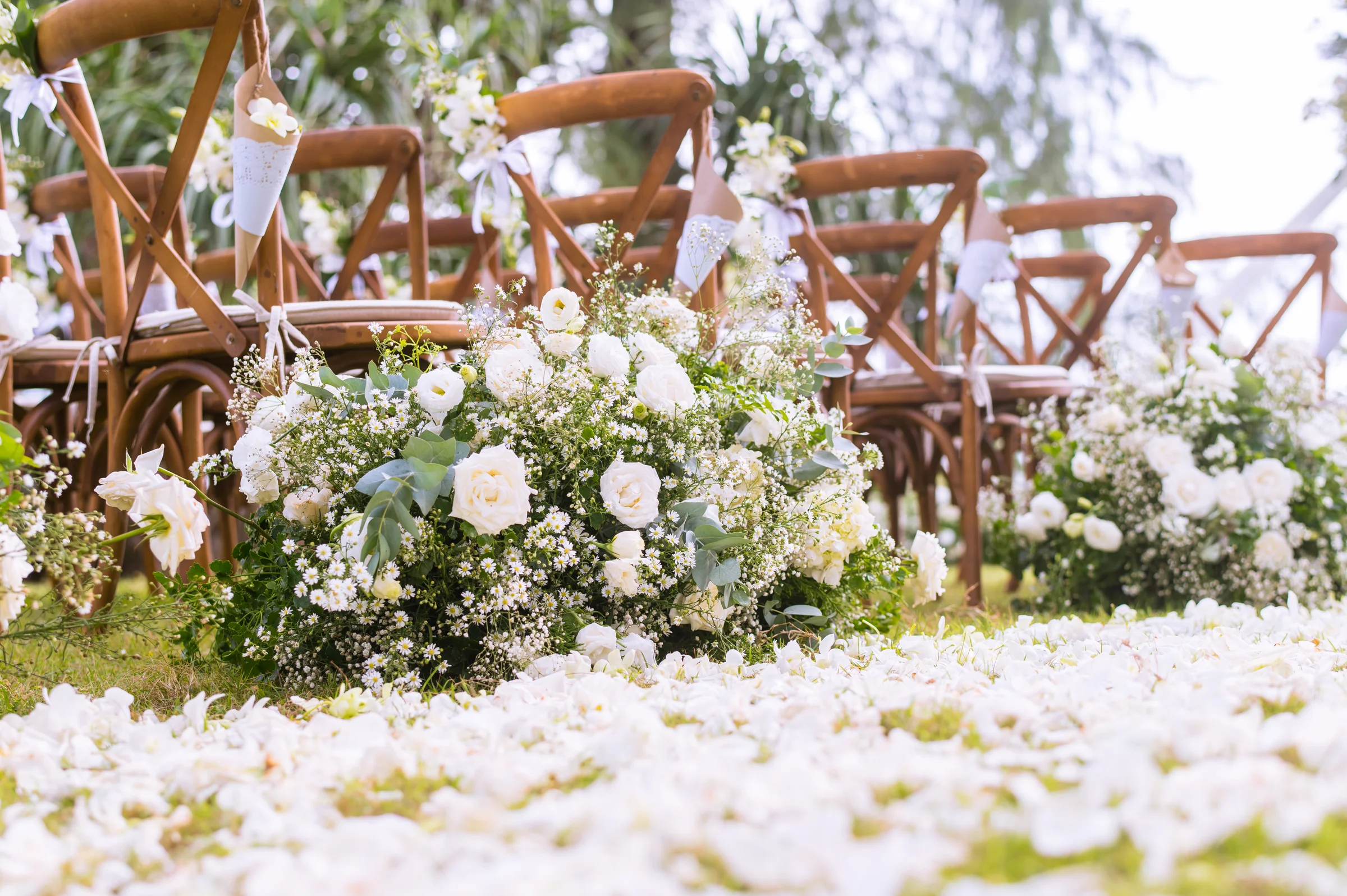 Beautiful event setup with flowers and chairs