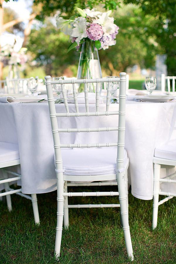 White chairs setup for outdoor event