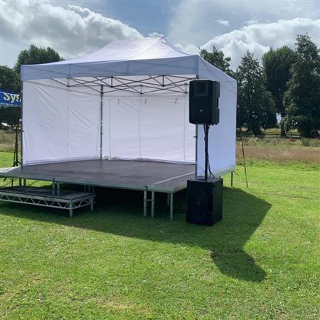 4.5M x 3M - 2FT Outdoor Covered Stage | Black Box Rentals