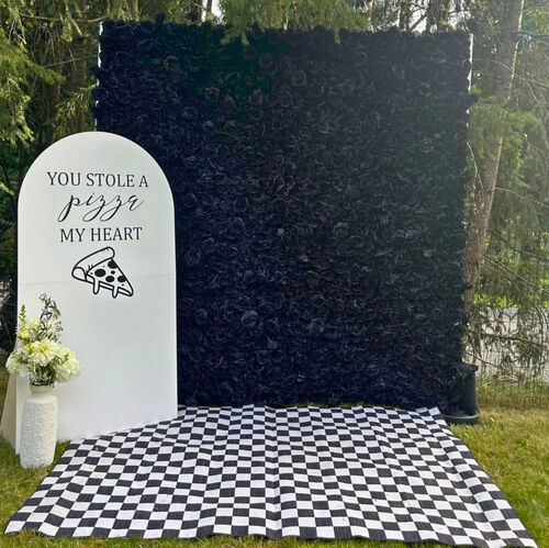 Black Backdrop Flower Wall at Wedding Venue